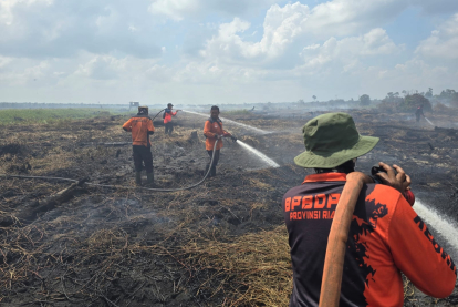GoRiau Tabur 11 Ton Garam di Langit Riau, Modifikasi Cuaca Berhasil Tekan Titik Api Karhutla