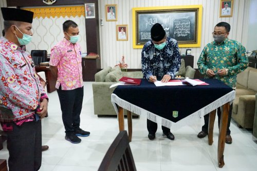 Bupati Sudah Teken Adendum NPHD, Pilkada Siak Dipastikan Dalam Suasana Covid-19