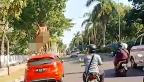 Viral Video Pria Tanpa Busana Menari di Atas Mobil yang Berjalan, Ini Keterangan Kasatlantas Polresta Pekanbaru