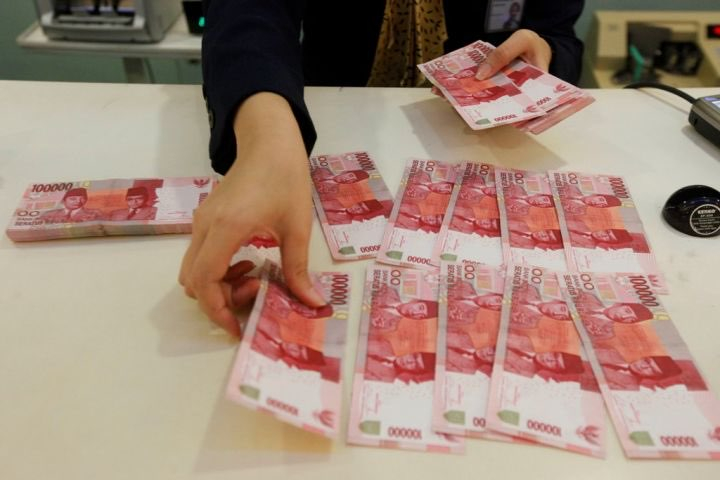 Suku Bunga The Fed Berpeluang Turun, Nilai Tukar Rupiah Bertahan Stagnan di Rp17.877