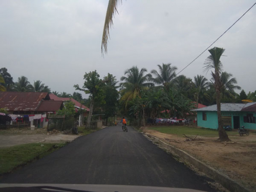 Pemkab Kampar Aspal Jalan di Desa Tanjung, Kades Ucapkan Terimakasih dan Berharap Tahun Depan Ditambah