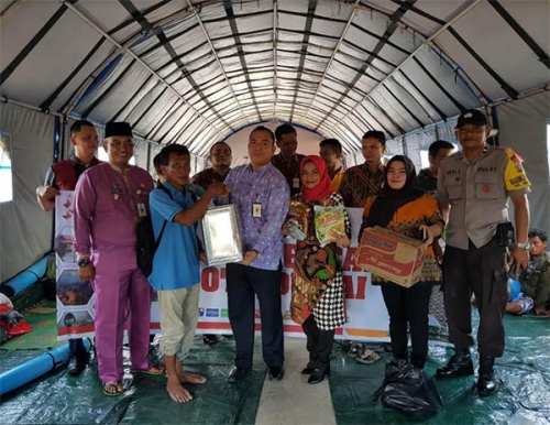 Bank Riau Kepri Cabang Dumai Salurkan Bantuan Korban Banjir di Kelurahan Bumi Ayu