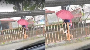 GoRiau Mengharukan, Siswi Kelas Unggulan Gendong Temannya yang Autis Terobos Hujan