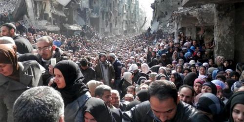 Inilah Foto Wajah Kelaparan dan Ketakutan Ribuan Pengungsi Palestina di Yarmuk