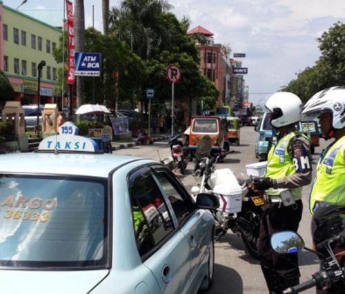 Tak Taat Aturan, Polresta Pekanbaru Minta Walikota Cabut Izin Usaha Taksi